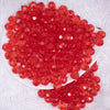 top view of a pile of 12mm Red Transparent Faceted Shaped Bubblegum Beads
