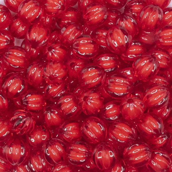 close up view of a pile of 12mm Red Transparent Pumpkin Shaped Bubblegum Beads