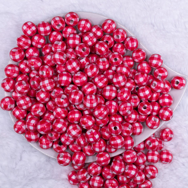 Top view of a pile of 12mm Red & White Picnic Plaid Print Chunky Acrylic Bubblegum Beads - 20 Count