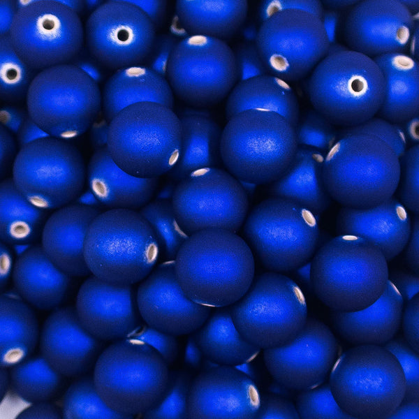 Close up view of a pile of 12mm Royal Blue Matte 