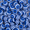 Close up view of a pile of 12mm Royal Blue with White Stripes Resin Chunky Bubblegum Beads