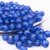 front view of a pile of 12mm Royal Blue Transparent Pumpkin Shaped Bubblegum Beads