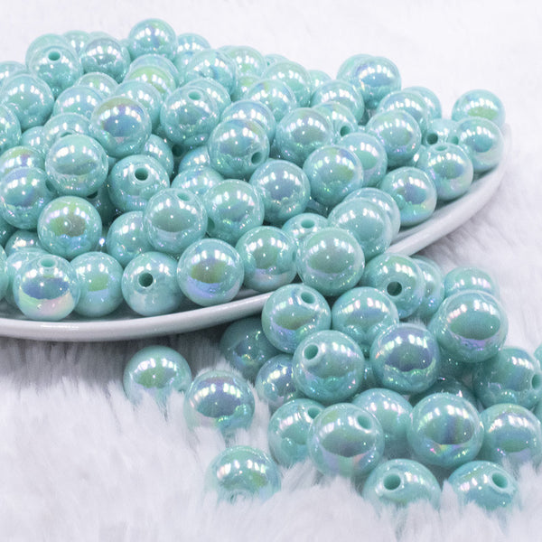 front view of a pile of 12mm Sea Foam Blue AB Solid Acrylic Bubblegum Beads
