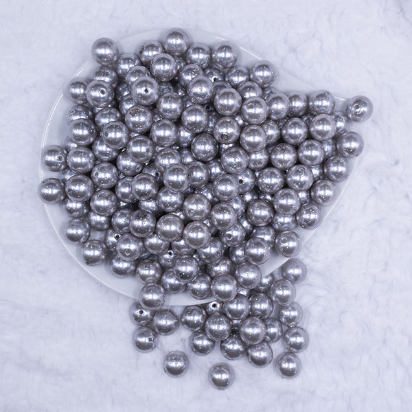 Top view of a pile of 12mm Silver with Glitter Faux Pearl Acrylic Bubblegum Beads - 20 Count