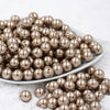 front view of a pile of 12mm Champagne Gold Faux Pearl Acrylic Bubblegum Beads [20 Count]