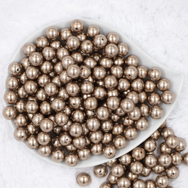 top view of a pile of 12mm Champagne Gold Faux Pearl Acrylic Bubblegum Beads [20 Count]