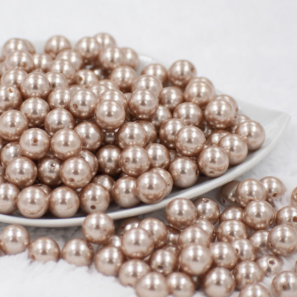 front view of a pile of 12mm Light Champagne Faux Pearl Acrylic Bubblegum Beads [20 Count]