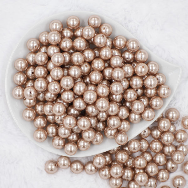 top view of a pile of 12mm Light Champagne Faux Pearl Acrylic Bubblegum Beads [20 Count]