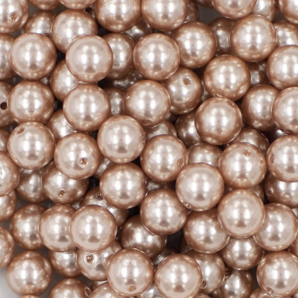 close up view of a pile of 12mm Light Champagne Faux Pearl Acrylic Bubblegum Beads [20 Count]