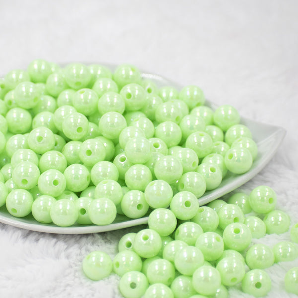 Front view of a pile of 12mm Mint Green AB Solid Acrylic Bubblegum Beads [20 & 50 Count]
