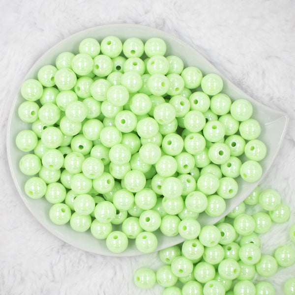 Top view of a pile of 12mm Mint Green AB Solid Acrylic Bubblegum Beads [20 & 50 Count]