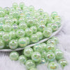 front view of a pile of 12mm Spearmint AB Solid Acrylic Bubblegum Beads