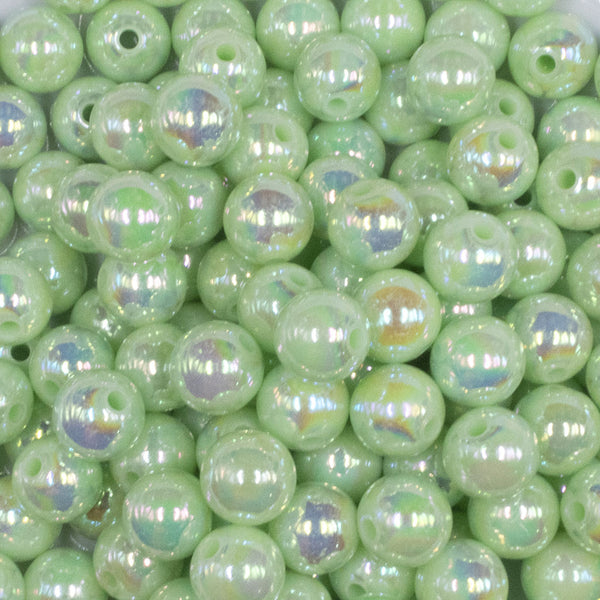 close up view of a pile of 12mm Spearmint AB Solid Acrylic Bubblegum Beads