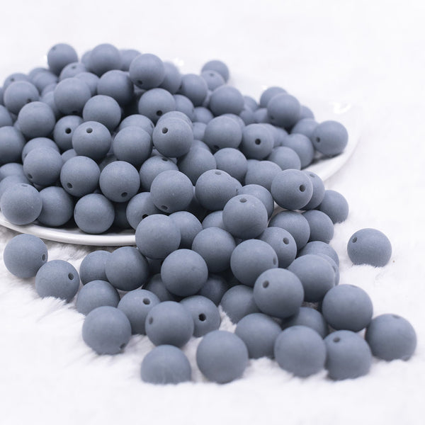 Front view of a pile of 12mm Steel Blue Matte Acrylic Bubblegum Beads