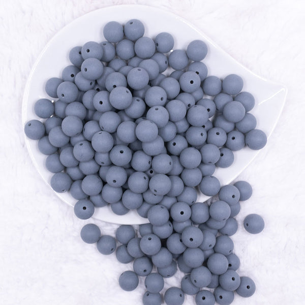 Top view of a pile of 12mm Steel Blue Matte Acrylic Bubblegum Beads