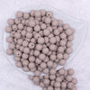 Top view of a pile of 12mm Tan Matte Acrylic Bubblegum Beads