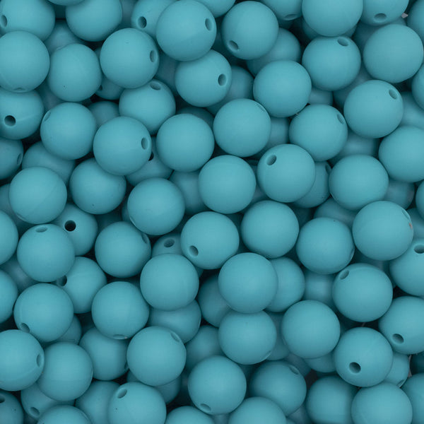 close up view of a pile of 12mm Turquoise Round Silicone Bead