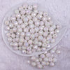 Top view of a pile of 12mm White Disco AB Solid Acrylic Bubblegum Beads12mm White Disco AB Solid Acrylic Bubblegum Beads