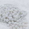 Front view of a pile of 12mm White Iridescent AB Solid Acrylic Bubblegum Beads [20 Count]