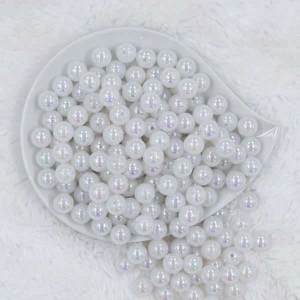 Top view of a pile of 12mm White Iridescent AB Solid Acrylic Bubblegum Beads [20 Count]