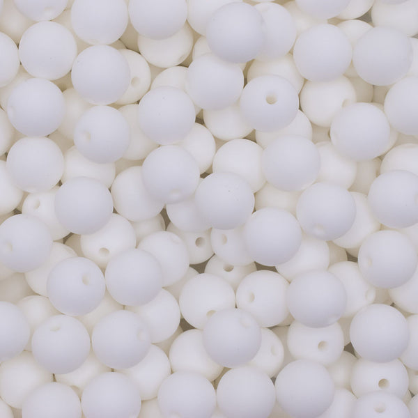 Close up view of a pile of 12mm White Round Silicone Bead