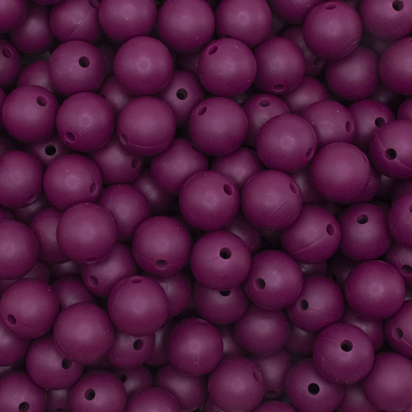 close up view of a pile of 12mm Wine Red Round Silicone Bead