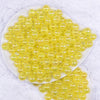 Top view of a pile of 12mm Yellow Crackle Bubblegum Beads
