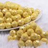 front view of a pile of 12mm Yellow Disco AB Solid Acrylic Bubblegum Beads