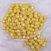 top view of a pile of 12mm Yellow Disco AB Solid Acrylic Bubblegum Beads