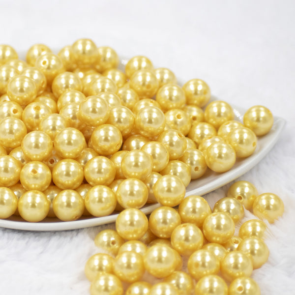 front view of a pile of 12mm Yellow Pearl Acrylic Bubblegum Beads [20 Count]