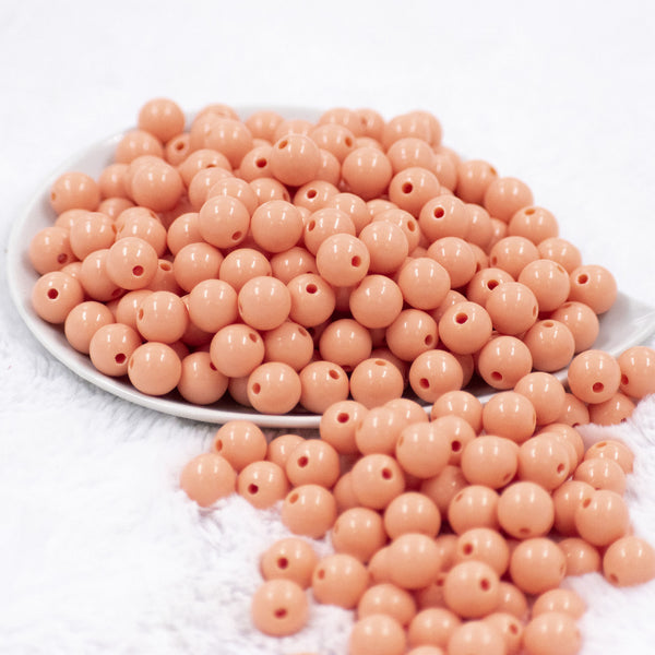 Front view of a pile of 12mm Apricot Orange Acrylic Bubblegum Beads [20 & 50 Count]