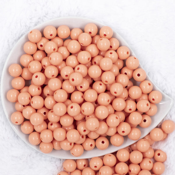 Top view of a pile of 12mm Apricot Orange Acrylic Bubblegum Beads [20 & 50 Count]