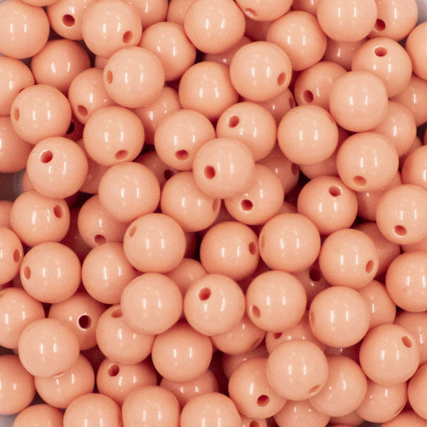 Close up view of a pile of 12mm Apricot Orange Acrylic Bubblegum Beads [20 & 50 Count]