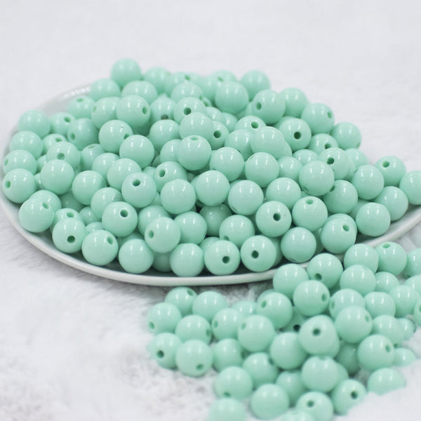 Front view of a pile of 12mm Aqua Blue Solid Acrylic Bubblegum Beads [20 & 50 Count]