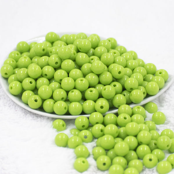 Front view of a pile of 12mm Green Apple Acrylic Bubblegum Beads [20 & 50 Count]
