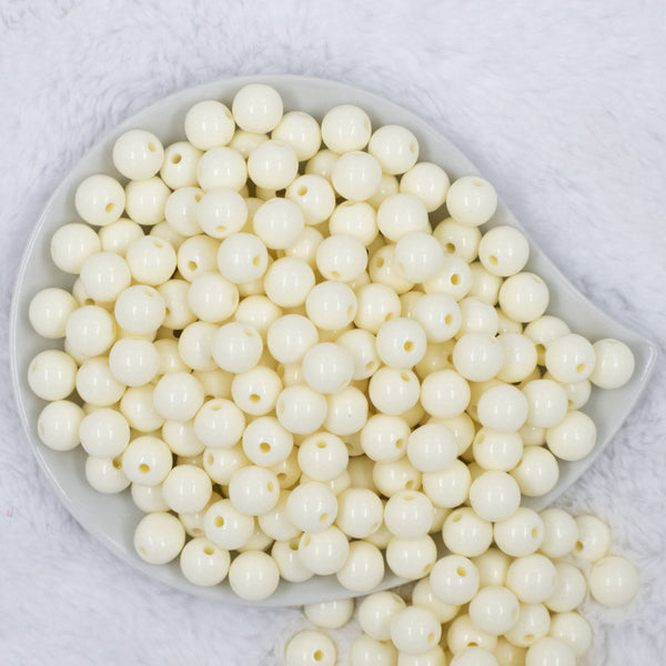 Top View of a pile of 12mm Ivory Acrylic Bubblegum Beads [20 & 50 Count]
