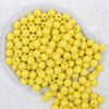 Top view of a pile of 12mm Lemon Yellow Solid Acrylic Bubblegum Beads [20 & 50 Count]