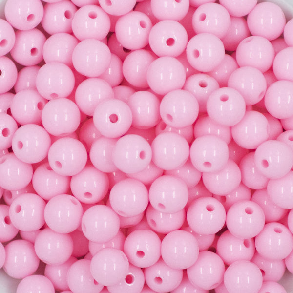 Close up view of a pile of 12mm Pink Solid Acrylic Bubblegum Beads [20 & 50 Count]