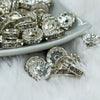 front of a pile of 12mm Silver Rondelle Spacer Beads [Set of 10]