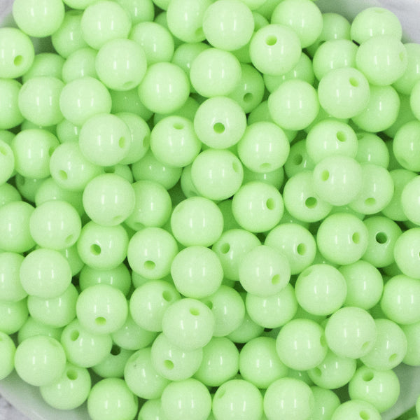 Close up view of a pile of 12mm Spearmint Green Acrylic Bubblegum Beads [20 & 50 Count]