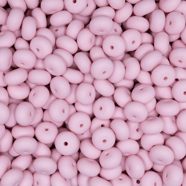 top view of a pile of 14mm Candy Pink Abacus Silicone Bead
