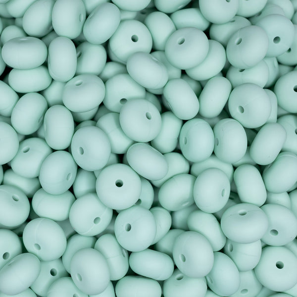 top view of a pile of 14mm Mint Green Abacus Silicone Bead