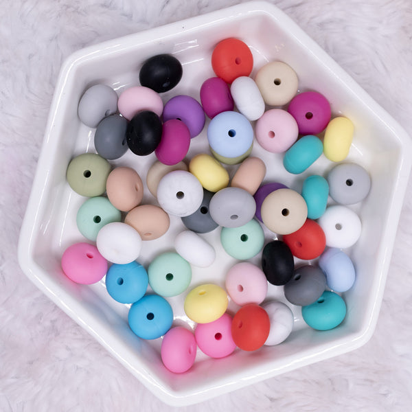 top view of a pile of 14mm Mixed Color Abacus Silicone Bead Lot