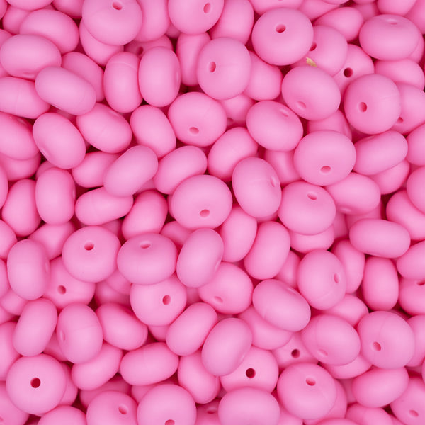 top view of a pile of 14mm Pink Abacus Silicone Bead