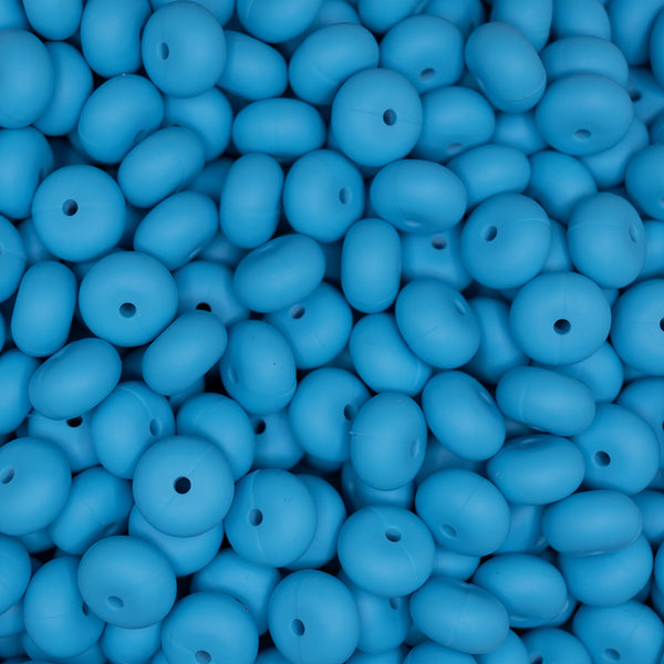 top view of a pile of 14mm Sky Blue Abacus Silicone Beads