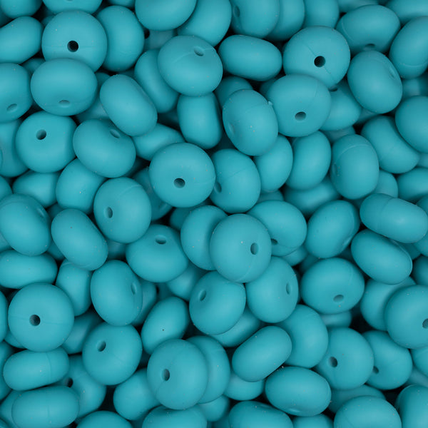 top view of a pile of 14mm Turquoise Abacus Silicone Beads