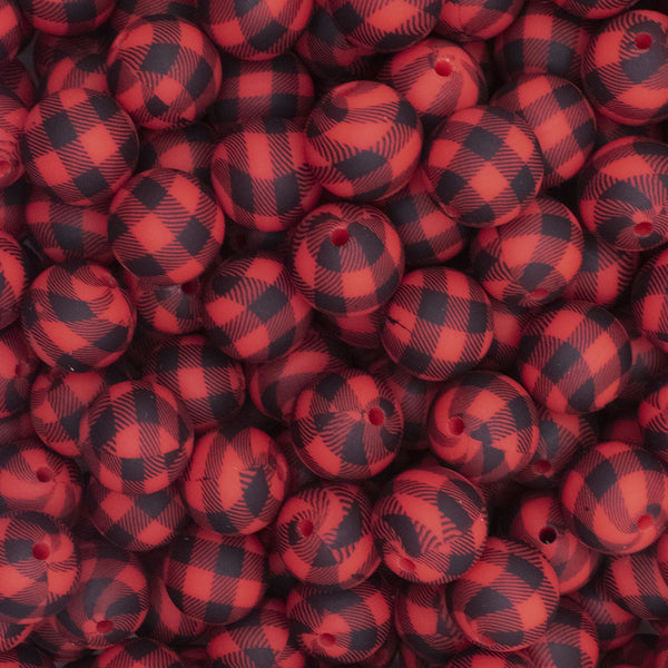 close up view of a pile of 15mm Red and Black Plaid Print Round Silicone Bead