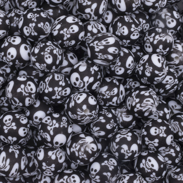 close up view of a pile of 15mm Black Skull Print Round Silicone Bead