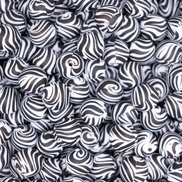 top view of a pile of 15mm Black and White Zebra Print Silicone Bead
