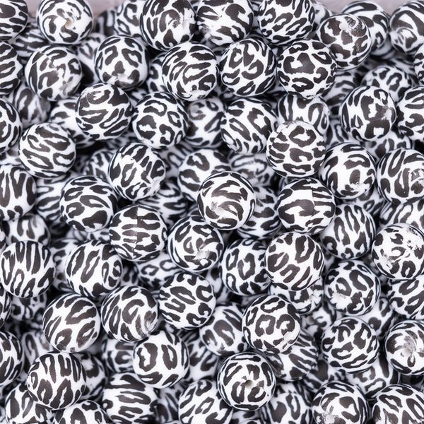 top view of a pile of 15mm Black and White Leopard print Silicone Bead